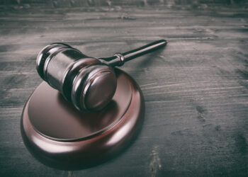 Court gavel on table.