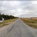 Google Streetview showing farm at right and planned smelter site at left.