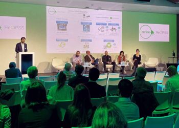 Presenters on stage at the C-SERVEES event.