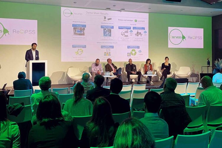 Presenters on stage at the C-SERVEES event.