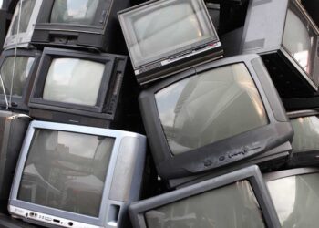 Pile of CRT televisions for recycling.