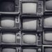Old CRTs stacked for recycling.