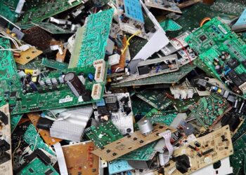 A pile of e-scrap circuit boards for recycling.