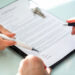 Signing a contract.