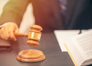 Judge holding a gavel.