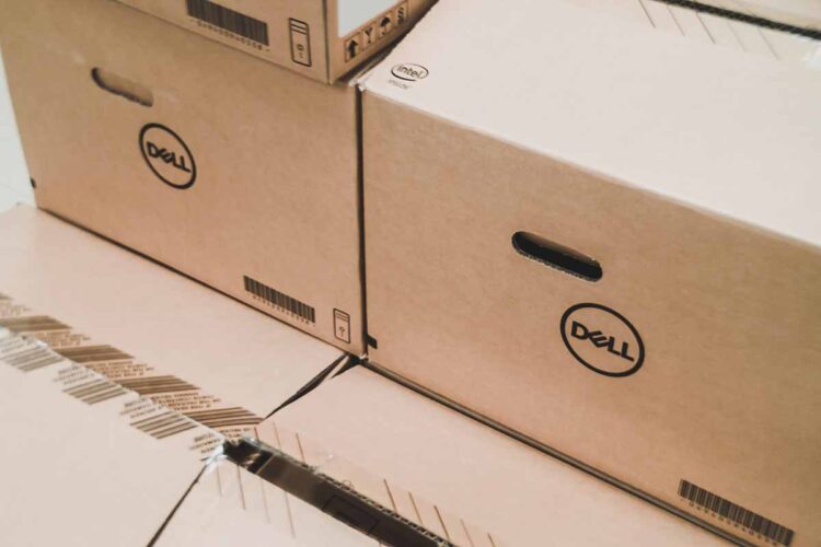 Dell computer boxes with desktop computers inside.