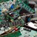 A pile of mixed e-scrap.