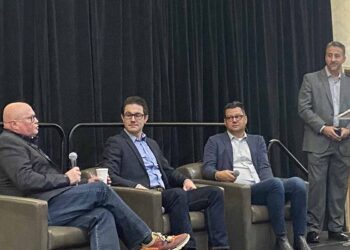 Speakers at a panel at the 2022 E-Reuse Conference.