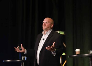 Bo Bodo of LI-Cycle speaks on stage at the 2022 E-Scrap Conference.