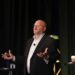 Bo Bodo of LI-Cycle speaks on stage at the 2022 E-Scrap Conference.
