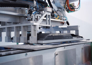 Northeast processor installs flat-panel processing robot