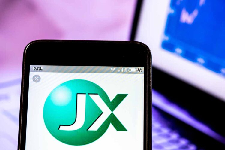 JX Nippon Mining and Metals logo on phone screen.