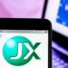 JX Nippon Mining and Metals logo on phone screen.