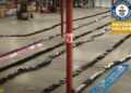 View of laptops fallen like dominos at Technology Recyclers facility.