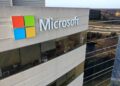 Microsoft company logo on building.