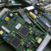 Discarded circuit boards gathered for recycling.