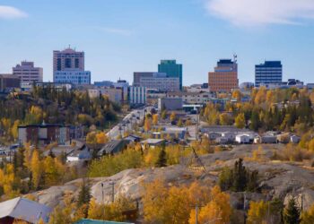 Yellowknife, Northwest Territories scene with trees and buildings.