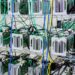 Bitcoin miners on shelves.