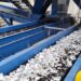 Shredded material on a conveyor at the evTerra Las Vegas facility.