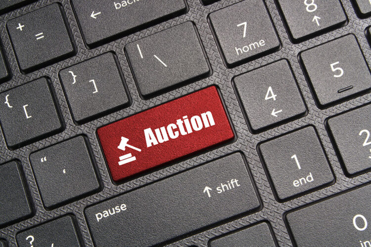 Keyboard with an auction button.