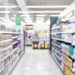 Retail aisle with paper and plastic packaging.