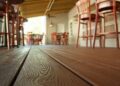 Closeup of Trex composite flooring installed in a restaurant.