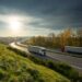 Trucks driving on a highway.