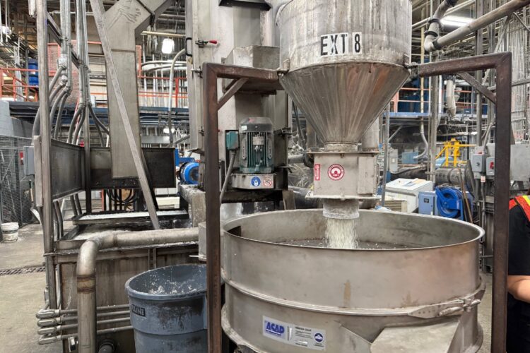 Extruder pushes out natural HDPE pellets at KW Plastics in Troy, Alabama.